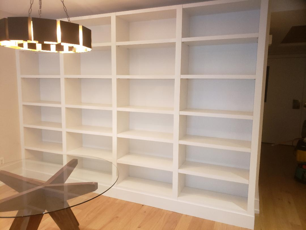 custom wall bookshelves by Space Age Closets & Custom Cabinetry in Toronto